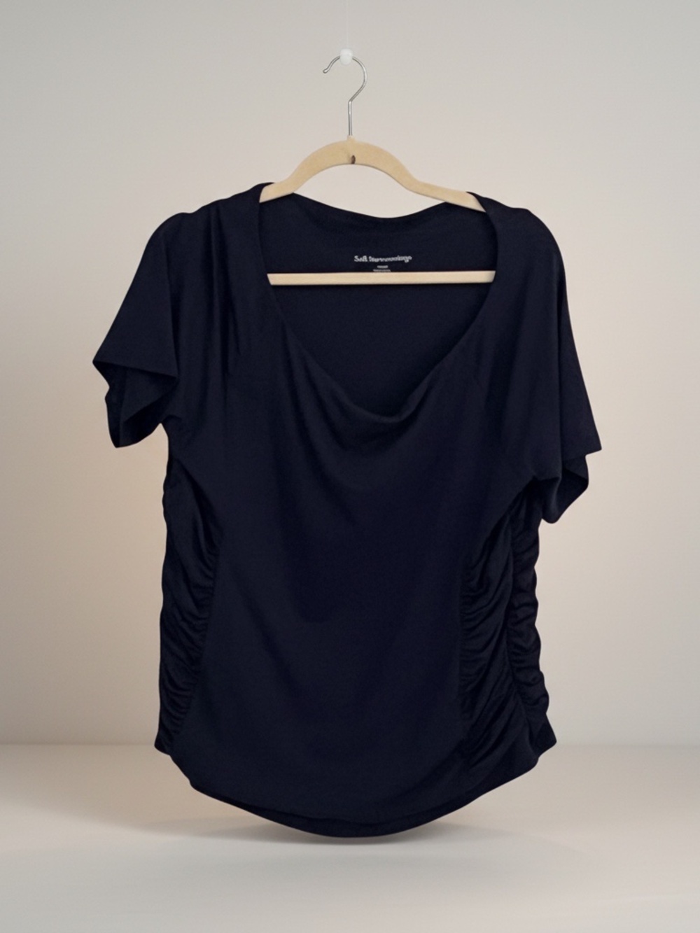 Navy blue top with short sleeves and shirred sides. Size XL